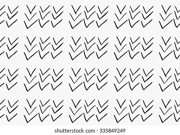 Black marker drawn simple check marks.Hand drawn with paint brush seamless background. Abstract texture. Modern irregular tilable design.