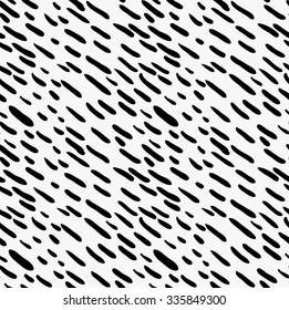 Black marker drawn simple diagonal hatches.Hand drawn with paint brush seamless background. Abstract texture. Modern irregular tilable design.