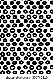 Black marker drawn simple donuts.Hand drawn with paint brush seamless background. Abstract texture. Modern irregular tilable design.