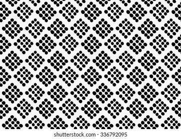 Black marker drawn simple dots forming diamonds.Hand drawn with paint brush seamless background. Abstract texture. Modern irregular tilable design.