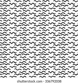 Black marker drawn simple short waves.Hand drawn with paint brush seamless background. Abstract texture. Modern irregular tilable design.