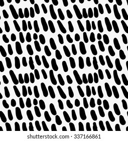 Black marker drawn simple water drops pattern.Hand drawn with paint brush seamless background. Abstract hand sketched rough seamless texture.Tribal ethnic creative repeating design for fabric textile.