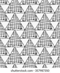 Black marker hatched triangles.Free hand drawn with ink brush seamless background. Abstract texture. Modern irregular tilable design.