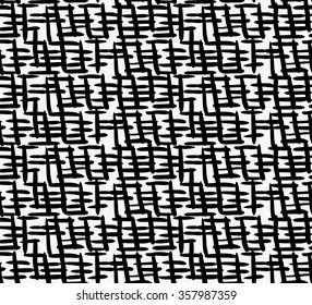 Black marker thick crossing hatches.Free hand drawn with ink brush seamless background. Abstract texture. Modern irregular tilable design.