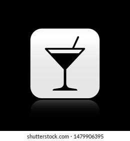 Black Martini glass icon isolated on black background. Cocktail icon. Wine glass icon. Silver square button. Vector Illustration