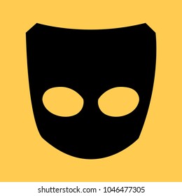 black mask on an orange background
