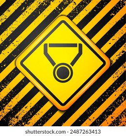 Black Medal icon isolated on yellow background. Winner symbol. Warning sign. Vector