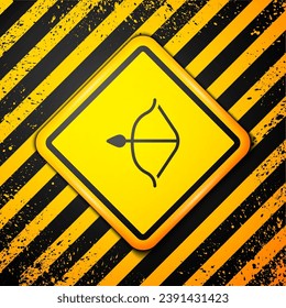 Black Medieval bow and arrow icon isolated on yellow background. Medieval weapon. Warning sign. Vector