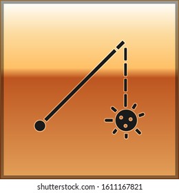Black Medieval chained mace ball icon isolated on gold background. Medieval weapon.  Vector Illustration