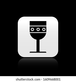 Black Medieval goblet icon isolated on black background. Silver square button. Vector Illustration