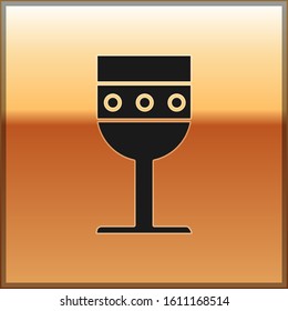 Black Medieval goblet icon isolated on gold background.  Vector Illustration