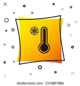 Black Meteorology thermometer measuring heat and cold icon isolated on white background. Thermometer equipment showing hot or cold weather. Yellow square button. Vector Illustration