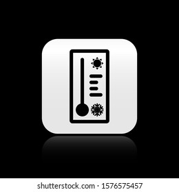 Black Meteorology thermometer measuring heat and cold icon isolated on black background. Thermometer equipment showing hot or cold weather. Silver square button. Vector Illustration