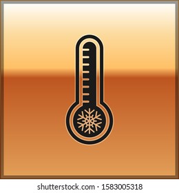 Black Meteorology thermometer measuring heat and cold icon isolated on gold background. Thermometer equipment showing hot or cold weather.  Vector Illustration