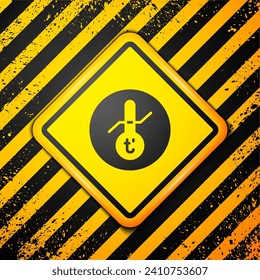 Black Meteorology thermometer measuring icon isolated on yellow background. Thermometer equipment showing hot or cold weather. Warning sign. Vector