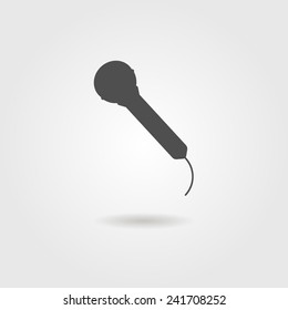 black microphone icon with shadow. concept of sound record. isolated on stylish background. minimalistic vector illustration