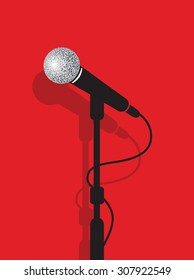 a black microphone stand on a red background