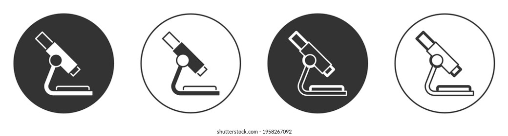 Black Microscope icon isolated on white background. Chemistry, pharmaceutical instrument, microbiology magnifying tool. Circle button. Vector