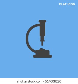 Black microscope vector icon on blue background