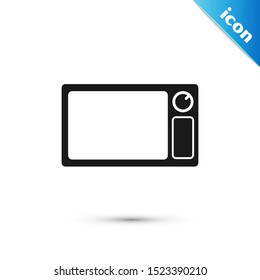 Black Microwave oven icon isolated on white background. Home appliances icon.  Vector Illustration