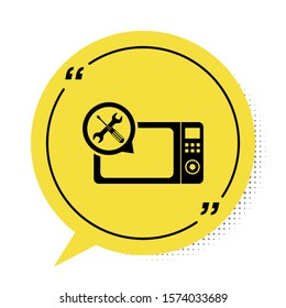 Black Microwave oven with screwdriver and wrench icon isolated on white background. Adjusting, service, setting, maintenance, repair, fixing. Yellow speech bubble symbol. Vector Illustration