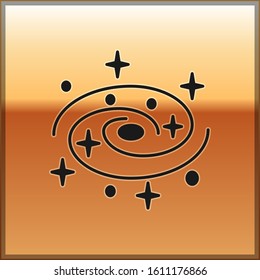 Black Milky way spiral galaxy with stars icon isolated on gold background.  Vector Illustration