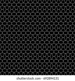 Black mini figures tessellation on white background. Image with floral shapes. Ethnic mosaic tiles motif. Seamless surface pattern design with interlocking oriental ornament. Window tracery wallpaper.