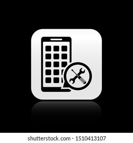 Black Mobile Apps with screwdriver and wrench icon isolated on black background. Adjusting, service, setting, maintenance, repair, fixing. Silver square button. Vector Illustration