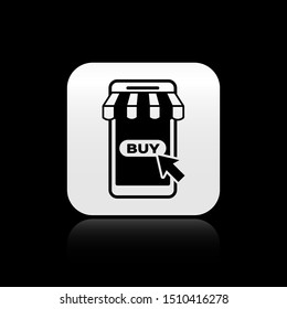 Black Mobile phone and shopping cart with striped awning icon isolated on black background. Online buying symbol. Supermarket basket symbol. Silver square button. Vector Illustration