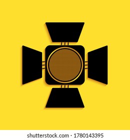 Black Movie spotlight icon isolated on yellow background. Light Effect. Scene, Studio, Show. Long shadow style. Vector