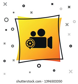 Black Movie or Video camera and gear icon isolated on white background. Adjusting app, service concept, setting options, maintenance, repair, fixing. Yellow square button. Vector Illustration