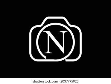 Black N monogram letter luxury alphabet with a camera icon. Photography logo vector illustration. Modern logo design for photography business, and company identity.