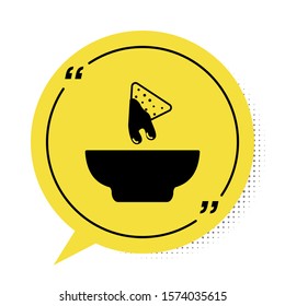 Black Nachos in plate icon isolated on white background. Tortilla chips or nachos tortillas. Traditional mexican fast food. Yellow speech bubble symbol. Vector Illustration