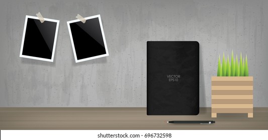 Black notebook and blank photo frame in vintage room space background. Vector illustration.
