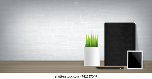 Black notebook and blank photo frame with decoration plant in vintage room space background. Vector illustration.