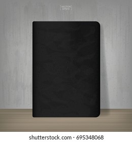 Black notebook on wooden shelf with vintage concrete wall background. Vector illustration.