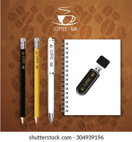 black Notebook pencil with pen drive Menu Restaurant Background coffee beans brown