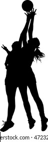 Black on silhouette of girls ladies netball players competing for ball in air