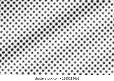 Black on white halftone vector texture. Rough perforated surface. Small dotwork gradient for vintage effect. Digital pop art background. Monochrome halftone overlay. Black ink dot texture card