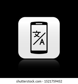 Black Online translator icon isolated on black background. Foreign language conversation icons in chat speech bubble. Translating concept. Silver square button. Vector Illustration