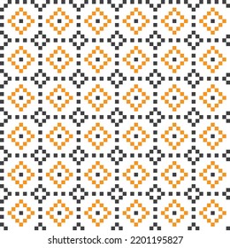 Black and orange cross-stitch knitting pattern on white background. Black and orange square dots on white backdrop. Halloween color theme fabric pattern design for sale. Knitting handicraft art.