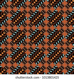 Black, orange and red ethnic geometric motif seamless pattern in black, orange and red on abstract background.