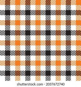 Black, orange and white herringbone gingham. Seamless vector plaid pattern suitable for fashion, home decor and stationary.