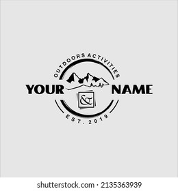 black outdoor logo badge with mountain