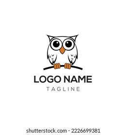 the black owl logo is perched on a branch