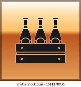 Black Pack of beer bottles icon isolated on gold background. Wooden box and beer bottles. Case crate beer box sign.  Vector Illustration