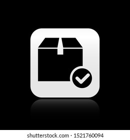 Black Package box with check mark icon isolated on black background. Parcel box with checkmark. Approved delivery or successful package receipt. Silver square button. Vector Illustration