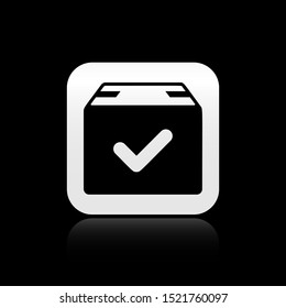 Black Package box with check mark icon isolated on black background. Parcel box with checkmark. Approved delivery or successful package receipt. Silver square button. Vector Illustration
