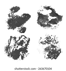 Black paint brush strokes on white paper