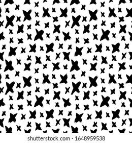 Black paint crosses vector seamless pattern. Decorative hand drawn letters X freehand illustration. Abstract monochrome wallpaper, wrapping paper design. Black ink crossed lines textile print